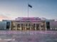 Parliament House with colorful light projections.