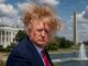 Man with windblown hair near Washington landmarks.