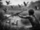 Hunter with spear among flying birds.