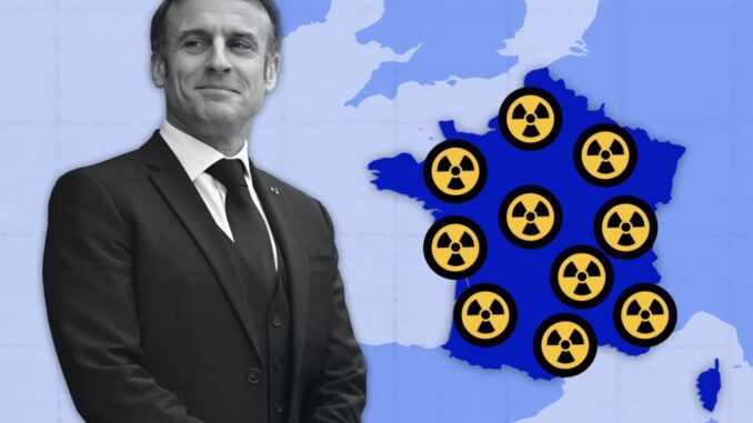 Man beside France map with nuclear symbols.