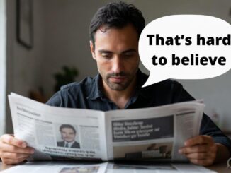 Man reading newspaper, speech bubble says: "That's hard.