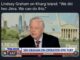 Man speaking on news program set.