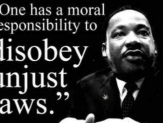 Man with quote on moral responsibility.