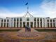 Parliament House with people in front.