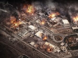 Aerial view of city engulfed in flames.