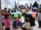 Children playing and learning in a classroom.