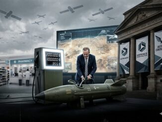 Man fueling missile at gas pump display.