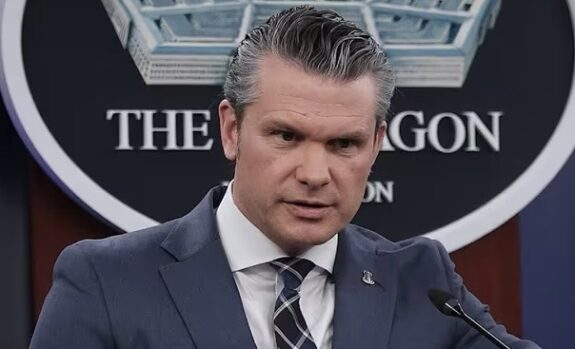 Man speaking at a Pentagon press conference. Man speaking at a Pentagon press conference.