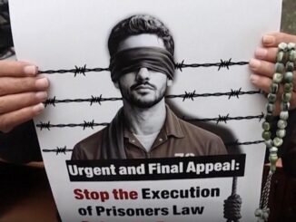 Protest sign against execution of prisoners law.