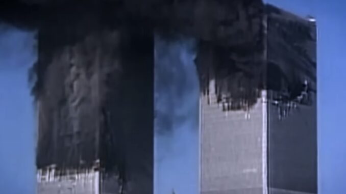 Twin Towers with heavy smoke, September 11 attacks.