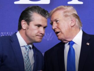 Two men conversing at an event.