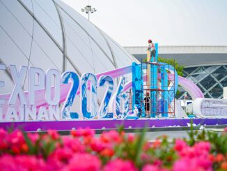 Workers setting up Hainan Expo 2023 structure.