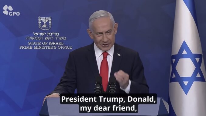 Man speaking at podium with Israeli flag Man speaking at podium with Israeli flag