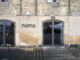 Noma restaurant entrance on cobblestone pavement