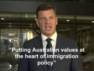 Man in suit speaking with immigration quote
