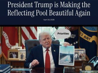 Man in office holds photo of reflecting pool
