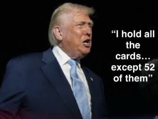 Man in dark suit with quote about cards