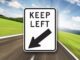 Keep left road sign with arrow