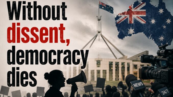 Protester with megaphone outside Australian parliament