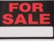 For Sale sign with blank white panel