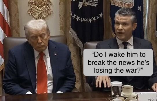 Two men in suits at political meeting