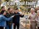 Family angrily blaming elderly couple near street