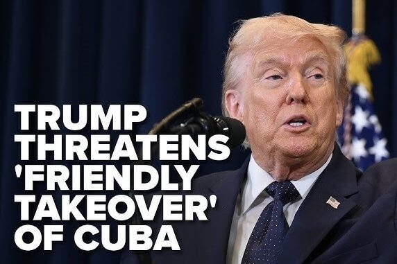 Politician at podium with Cuba takeover headline Politician at podium with Cuba takeover headline
