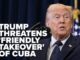 Politician at podium with Cuba takeover headline