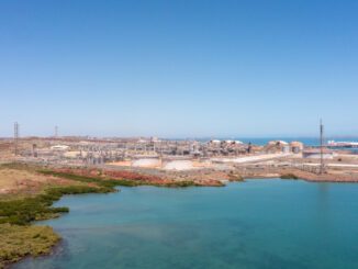 Aerial view of coastal industrial storage tanks