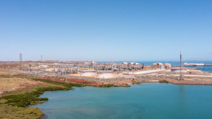Aerial view of coastal industrial storage tanks Aerial view of coastal industrial storage tanks
