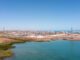 Aerial view of coastal industrial storage tanks