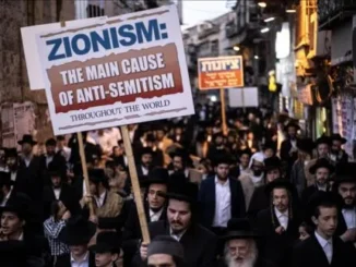 Crowd protest with sign reading "ZIONISM