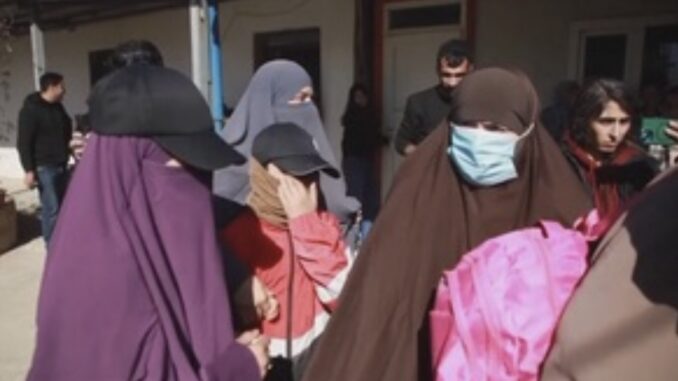 Women in burqas and face masks Women in burqas and face masks