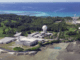 Coastal satellite tracking facility with white radomes