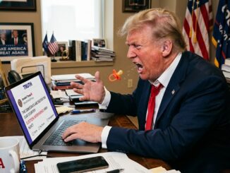 Frustrated person shouting at laptop in office