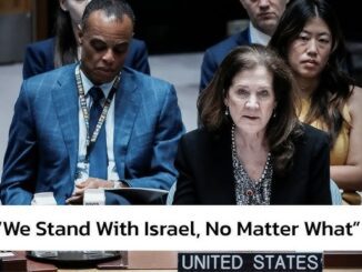 UN delegates with "We Stand With Israel" sign
