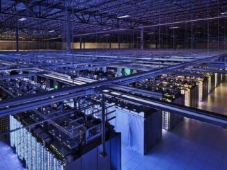 Large blue lit data center with server racks