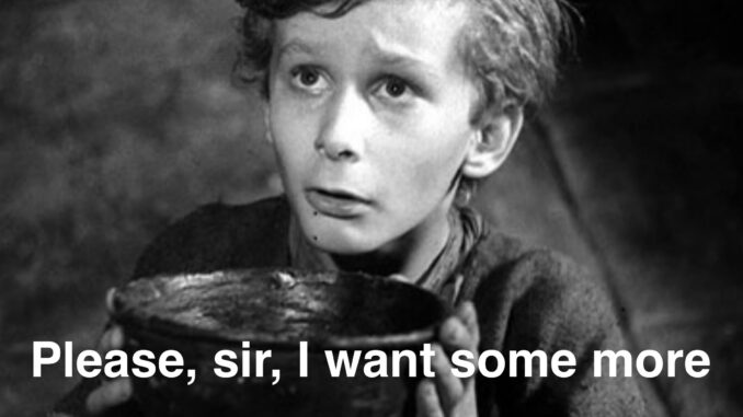 Black-and-white boy holding bowl pleading for food