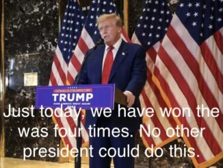 Man giving speech at podium with American flags