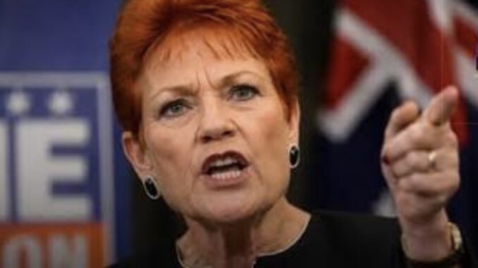 Red-haired woman pointing and speaking passionately Red-haired woman pointing and speaking passionately
