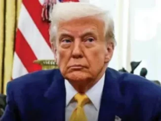 Man in suit with yellow tie in office
