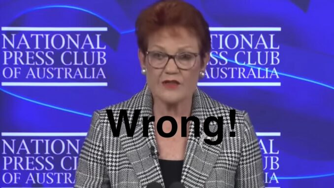 Person at National Press Club, "Wrong!" overlay Person at National Press Club, "Wrong!" overlay