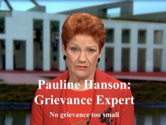Red-haired woman speaking in front of parliament building