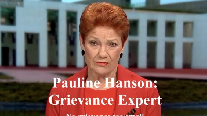 Red-haired woman speaking in front of parliament building