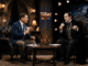Talk show host interviewing vampire character
