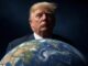 Blond man looming over Earth globe