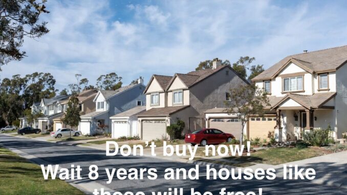 Row of suburban houses with parked cars