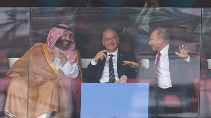 Three men laughing in stadium VIP box Three men laughing in stadium VIP box